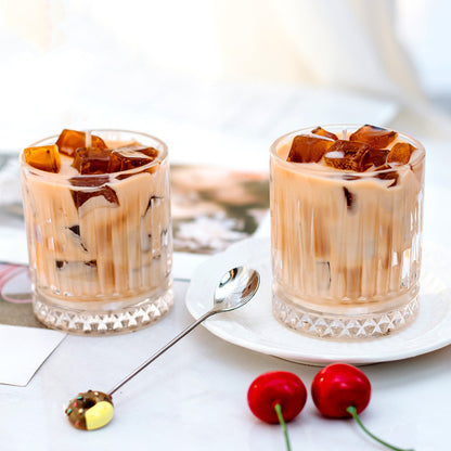 Delphy Iced Caffe Latte Soy Wax Candles in glass cups illustration.