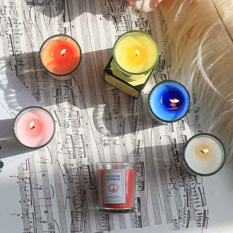 Top-down view of Delphy multi-color scented candles, perfect for creating a cozy and romantic Valentine's Day atmosphere