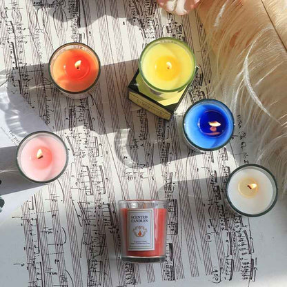 Top-down view of Delphy multi-color scented candles, perfect for creating a cozy and romantic Valentine's Day atmosphere
