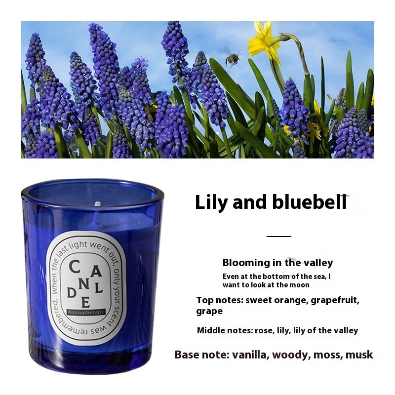 Detailed scent notes for Lily And Bluebell Flower Blue candle: Top notes: sweet orange, grapefruit, grape; middle notes: rose, lily, lily of the valley; base notes: vanilla, woody, moss, musk.