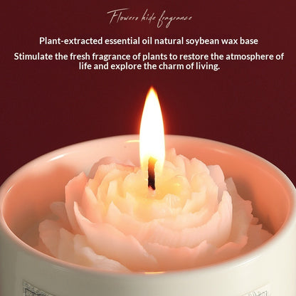 Close-up of a burning hand-carved camellia scented soy wax candle showcasing natural plant essential oil base and a warm glowing flame.