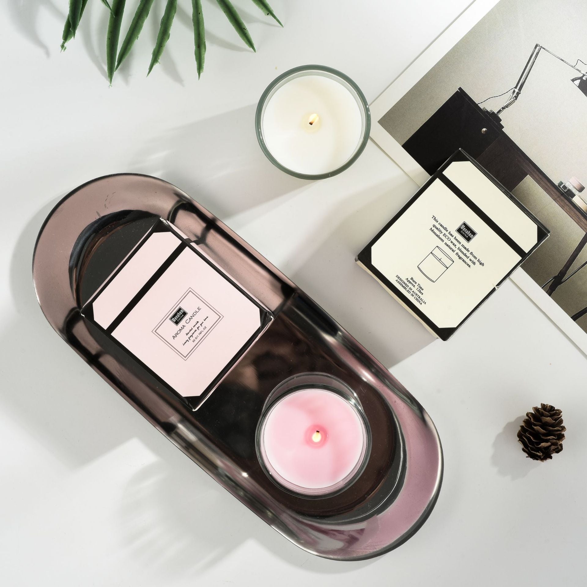 Elegant pink and yellow luxury gift box packaging for Delphy plant fragrance candles.