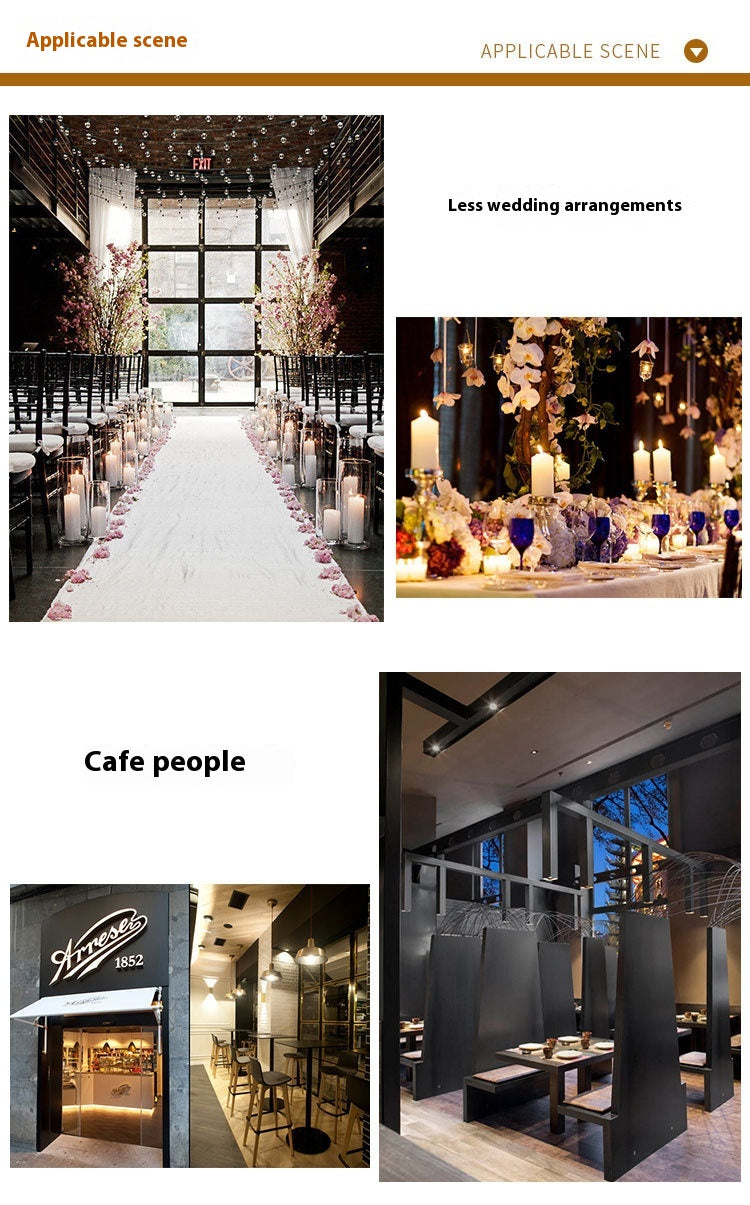 Elegant wedding aisle decorated with flameless LED candles in glass cylinders and pink floral arrangements.